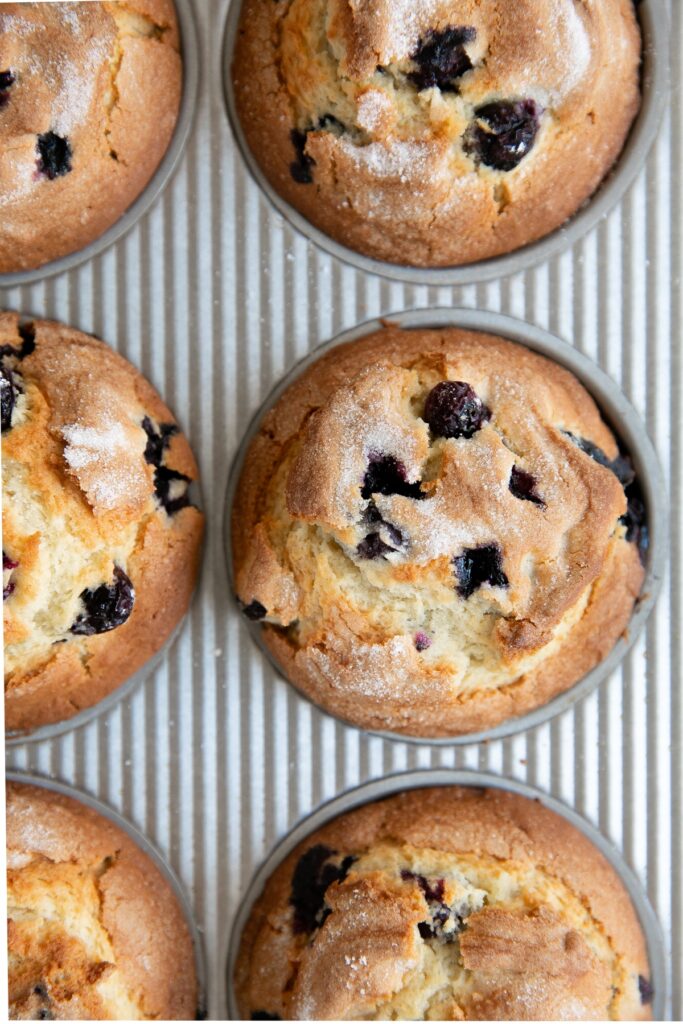 close up of blueberry muffins in pan